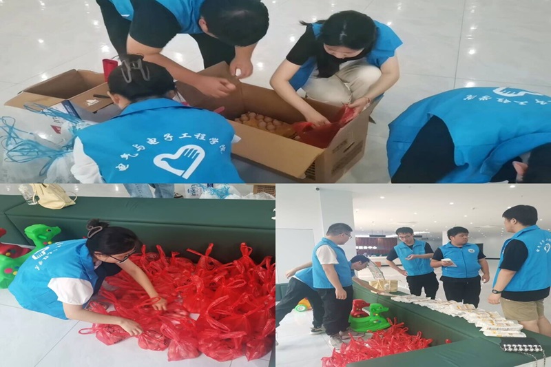 图为安信工卓越实践团在芜湖市湾沚区湾沚镇新都社区分配物资.jpg