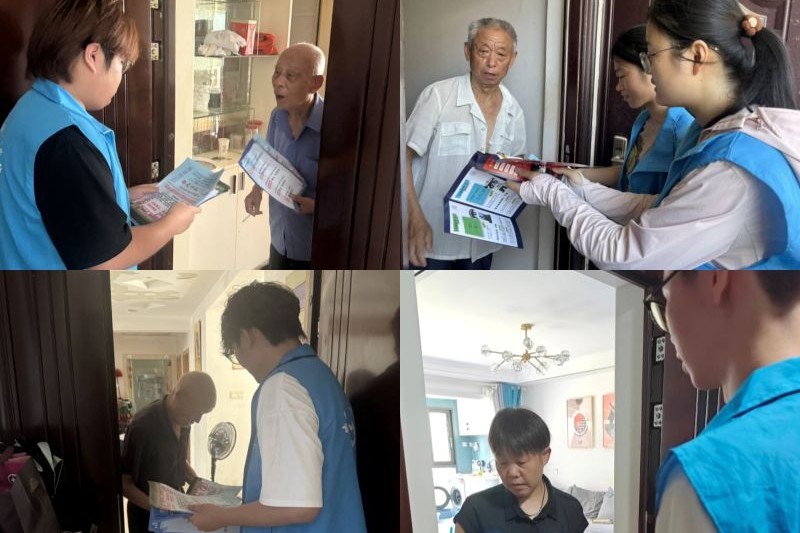 图为志愿者向居民宣传防诈骗.jpg